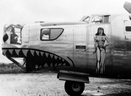 A B-24 bomber with nose art in the CBI during WWII.