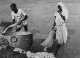 Dhobi wallas doing laundry in India during WWII.