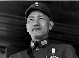 Chiang Kai-shek reviewing troops in China, 1944.  Photo by T/Sgt. Syd Greenberg.