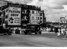 Street scene and large billboards in India during WWII.  Photo from Frank A. Bond.