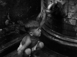 Calcutta street urchin.  Photo by J. J. O'brien.