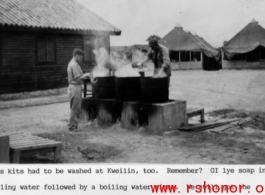 GIs washing mess kits at camp in Guilin, during WWII.