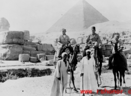 GIs ride camels in Cairo while on their way back to US from China after the end of the war.