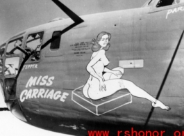 Nose art on B-24  bomber "Miss Carriage" during WWII.