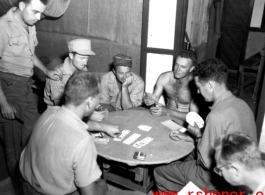 American servicemen while away the time playing cards in the CBI during WWII.