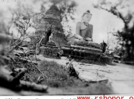 Shell torn Burmese Buddha at Bhamo, Burma, during WWII.