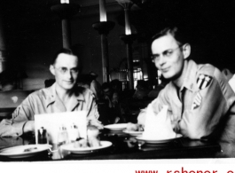 Two GIs have an elegant dinner in the CBI during WWII.  Walter De Blair.