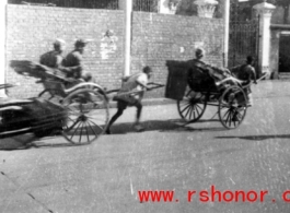 Rickshaws on the road in the CBI during WWII.