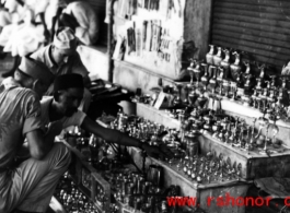GIs buy brassware in India during WWII.