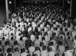 GIs packed in tight at a movie theater in Kunming, China, during WWII.