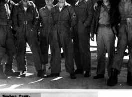 10th Air Force bomber crew during WWII. The aircraft in the background is a B-24 or B-29 bomber.