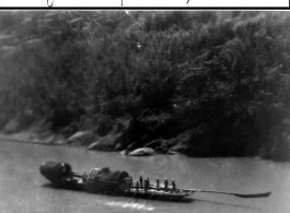 Large sampan with a number of oarsmen on river north of Kunming, China, May 1945.