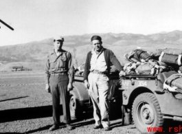 At the front of a B-25, parachute men. Image is looking west across field, Yangkai, Spring 1945. Ted & Estes.