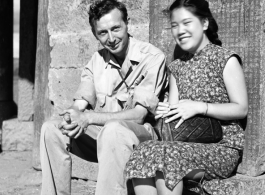 Wozniak and a VIP Chinese woman pose at a pavilion.