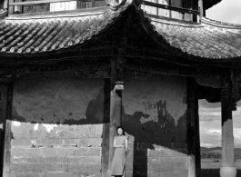 A VIP Chinese woman poses at a pavilion in Songming county during a day outing. During WWII.