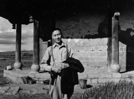 A VIP Chinese man poses before a pavilion in Songming county during WWII.