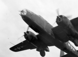 B-25 Mitchell bombers take off (or land) from an airstrip, possibly Yangkai (Yangjie) air strip in Yunnan province, China.