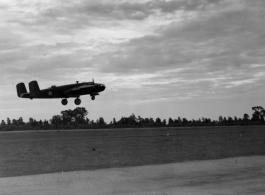 B-25 Mitchell bombers take off from an airstrip, possibly Yangkai (Yangjie) air strip in Yunnan province, China.