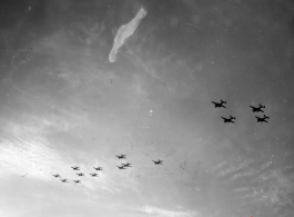 B-25 Mitchell bombers in flight in the CBI, in the area of southern China, Indochina, or Burma.