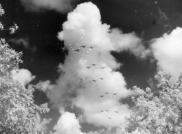 B-25 Mitchell bombers in flight in the CBI, in the area of southern China, Indochina, or Burma. During WWII.