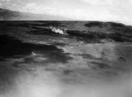 View of Tengchong from B-25 Mitchell bombers during battle with Japanese ground forces, flying over Tengchung (Tengchong), near the China-Burma border in far SW China.