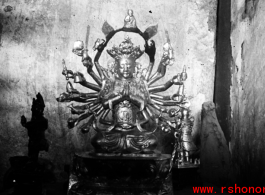 Buddhist statue in a temple in Yunnan, China, during WWII.