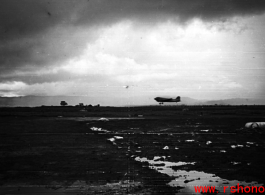 A C-47 lands at the base, probably Luliang in Yunnan province, China.