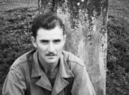 GI with grave marker in Yunnan, during WWII.