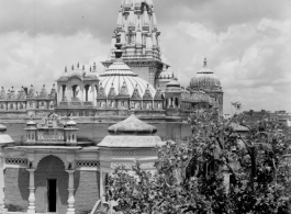 An elaborate temple.  Scenes in India witnessed by American GIs during WWII. For many Americans of that era, with their limited experience traveling, the everyday sights and sounds overseas were new, intriguing, and photo worthy.