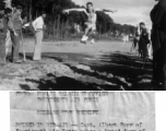 Capt. Albert Parr of the Fourteenth Air force makes a broad-jump at an American Forces track meet held in China during WWII.