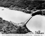 "Troops crossing Salween River by Hwi Tung [Huitong] footbridge, 8-2-44. US Army Photo 175-1." Burma. 2 August 1944.