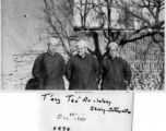 Three men in northern China, near Tung-Poo Railway, Hepei (Hebei) province, China. "Tang Tze An, Wang Shiang (interpreter)." December 20, 1044.  In the CBI during WWII.