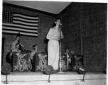 The "Jive-o-Lieps" of the 54th Air Service Group play music as a young GI works the microphone. In the CBI during WWII.