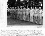 B-24 crew receives medal after sinking 550-foot Japanese cruiser in the South China Sea on August 19, 1944. Left to right: Capt. Jay E. Levan, 1st Lt. John D Shytle, Jr., 1st Lt. Lee O. Cunningham, T/Sgt. Harry A. Neiss, 2nd Lt. William R. McCaffrey, Jr., S/Sgt. Lawrence F. Bowar, T/Sgt. Charles W. Hemsley, S/Sgt. Thomas J. Murphy, S/Sgt. Bruce L. Ludwig, T/Sgt. Edward N. Odom.