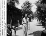 Lt. Clarence Miller walking in Kiunglai, China, not far from Chengdu, Sichuan province, China, where there was the A-5 base, for B-29 bombers.  Photo from Clarence W. Miller.