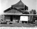 "The observation platform atop the control tower at liberated Hankou (Hankou) Air Base was an excellent place to pitch a pyramidal." During WWII.