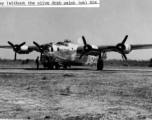 A B-24 bomber without the paint finish, in shiny aluminum, in the CBI during WWII.