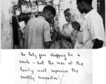 A woman in India buying a comb from a street vendor during WWII.  Photo from Mary Bernald.