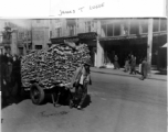 A hard-working wood peddler in Shanghai, right after WWII.  Photo from James T. Logue.