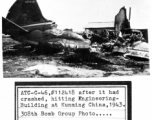 ATC C-46, tail number #112418, after it has crash, hitting Engineering Building at Kunming, China, in 1943.  308th Bombardment Group photo, provided by Robert L. Cowan.