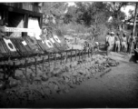 Chinese soldiers in Burma displaying captured Japanese weapons, personal gear, and  Japanese Good-Luck Flags  (寄せ書き日の丸) , during WWII. 