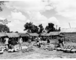 Earthenwares on display for sale at a market in Burma or India, during WWII.