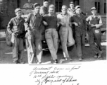 Armament crew, 16th Fighter Squadron, in front of "armament shack," Chenggong (Chengkung), China, during WWII.