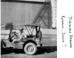 GI in front of dirigible hanger in Karachi, India, during WWII.  Image from Mark G. Mueller.  In the CBI during WWII. 