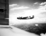 The B-25H "Rum Runner" from the 491st Bomb Squadron, the "RINGERS", flies in formation on a bombing mission during the Japanese "Ichigo" campaign. Sometime after this photo was taken Rum Runner, combat ID '439' was destroyed when they crashed landed near Liuzhou. No crewmen were seriously injured.