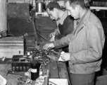 American GIs in the CBI at work on electronic gear during WWII.  Notice the case labeled to "Lt. R. V. Zalouder."