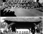 Local school kids in Yunnan province, China, during WWII.  The flag makes it the Songming County Xiaogu Central Elementary School (嵩明县效古中心小学校)