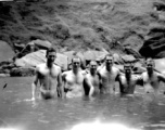 "This Is A Bunch Of 396th Guys Taking Advantage Of A Chance To Take A Bath And Enjoy A Swim At The Same Time. Sorry I Can Only Name Four Of Them. John Marlatt, Jr.,  and Dale Souder Are the First Two, And Ernie Estes And Marlin Reese At The End Of The Line."