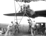 "This Is A Group Of 396th Mechanics Changing A B-24 Engine At Luichow (Liuzhou), China."