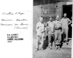 "This Is a picture of the (electric shop) shop area at Kwelin, China. The guys are Houser--Dowds--Harrison and an unknown Chinese man."
